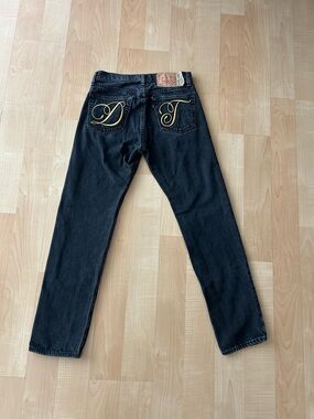 Denim Tears Metallic Gold Script DT Levi’s 501 Jeans